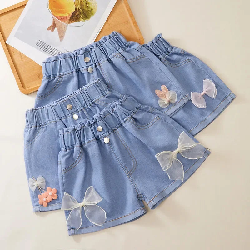 Short Jeans Infantil Laço e Flor